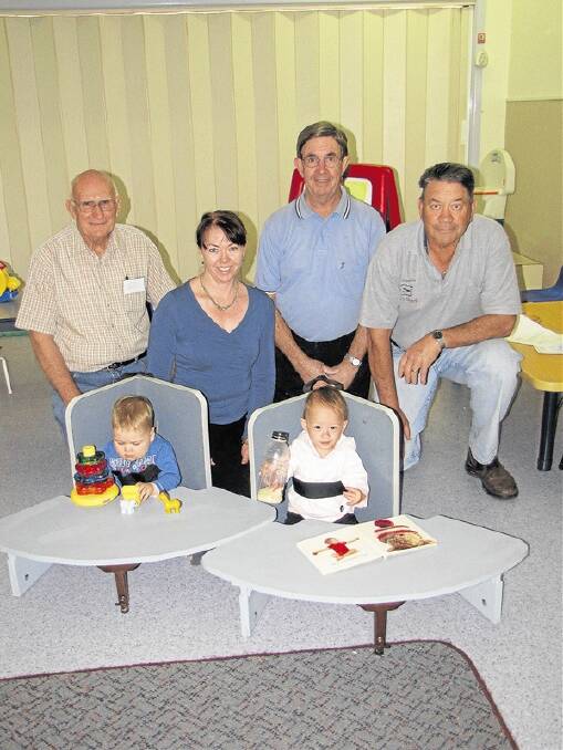 Finley Bush (15 months) and Adalyn Davies with Bert Barwick, physiotherapist Christine Sienkiewicz, Dubbo Men’s Shed chairman, Ross Toole and Phil Knight.