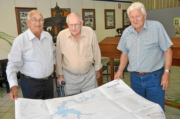 BACK ON THE MAP: Ron Foxall, Bill Inwood and Garry Braithwaite explain what lies beneath Burrendong Dam.         Photo: PATRICK BILLINGS