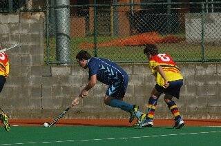 Young Crows talent Stuart McKenzie chases his South Bathurst opposite in their Premier Hockey League clash at West Dubbo on Saturday. The Crows went down 3-2 with McKenzie named Players' Player.