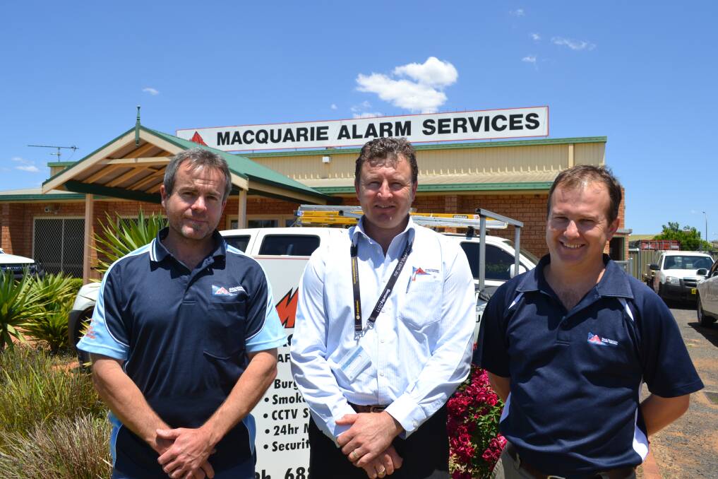 Smooth transition: Michael Lane, Cameron Humphries and Peter Hyde will take over the management and ownership of Macquarie Alarm Services.  
Photo: SIMON CHAMBERLAIN