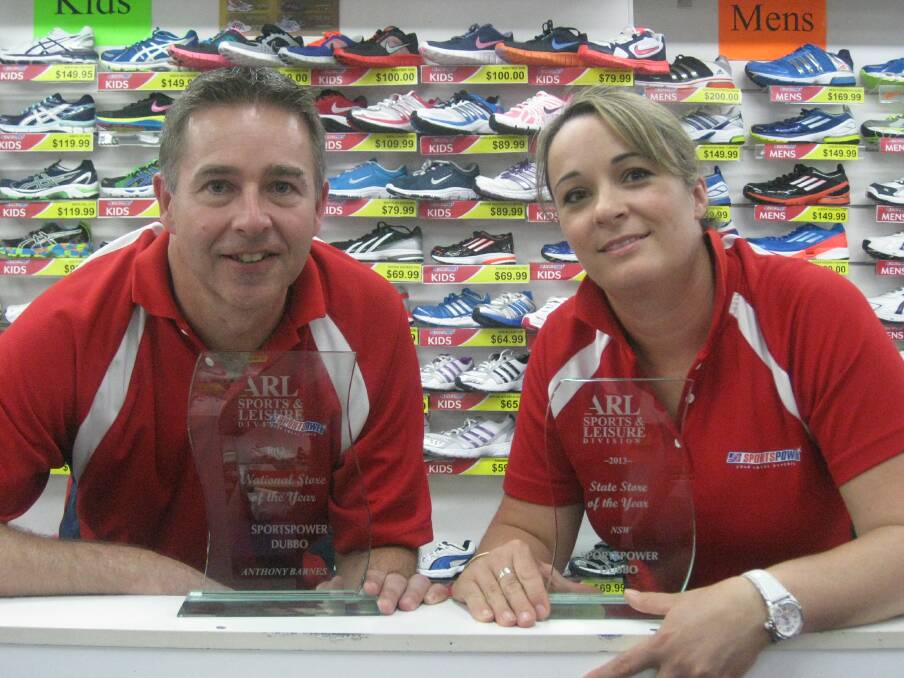 Anthony Barnes and Veronica Schulz with the Sportspower Store of the Year and NSW Store of the Year awards.