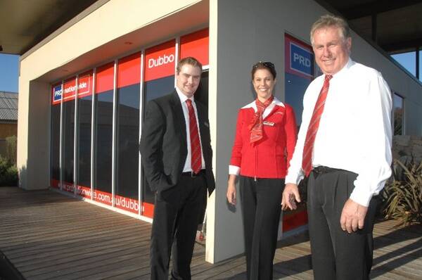 Mitch Rogers, Yvette Laws and Peter Whalan outside the new office of PRDnationwide in Dubbo. Photo: AMY GRIFFITHS