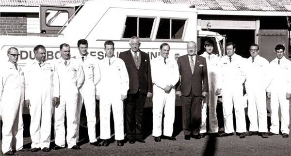 Max Walters is flanked by dignitaries and other members of Dubbo Rescue Squad at the commissioning of its truck in 1971.