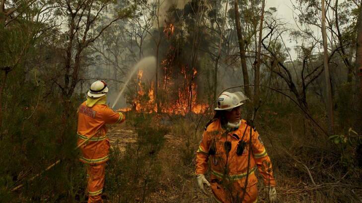 Emergency declared: An RFS team on the Bells Line of Road near Mt Victoria?on Sunday. Photo: Dean Sewell