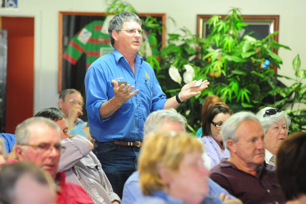 Sandy Cox, co-owner of the rural merchandise business Sullivans in Dunedoo, speaks up at the community forum in the town on October 9. Photo: LOUISE DONGES