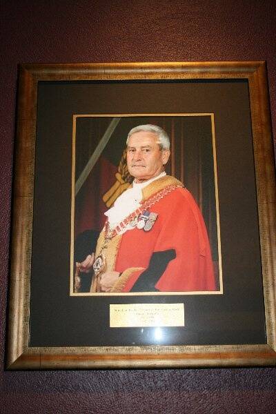 The portrait of former Dubbo mayor, Squadron Leader Tom Slattery, that hangs in council’s chambers. He will be buried following a requiem mass at St Brigid’s Church at 11am on Thursday.