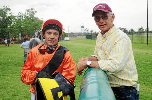Greg Ryan and Hinterland’s trainer Peter Nestor at Dubbo on Saturday. Tomorrow in the Muswellbrook Cup they will go their separate ways. Nestor will have Kody Nestor in the saddle on Boomerang, while Ryan will be legged up on Skullas Sister for Tracey Bartley.                   Photo: AMY GRIFFITHS