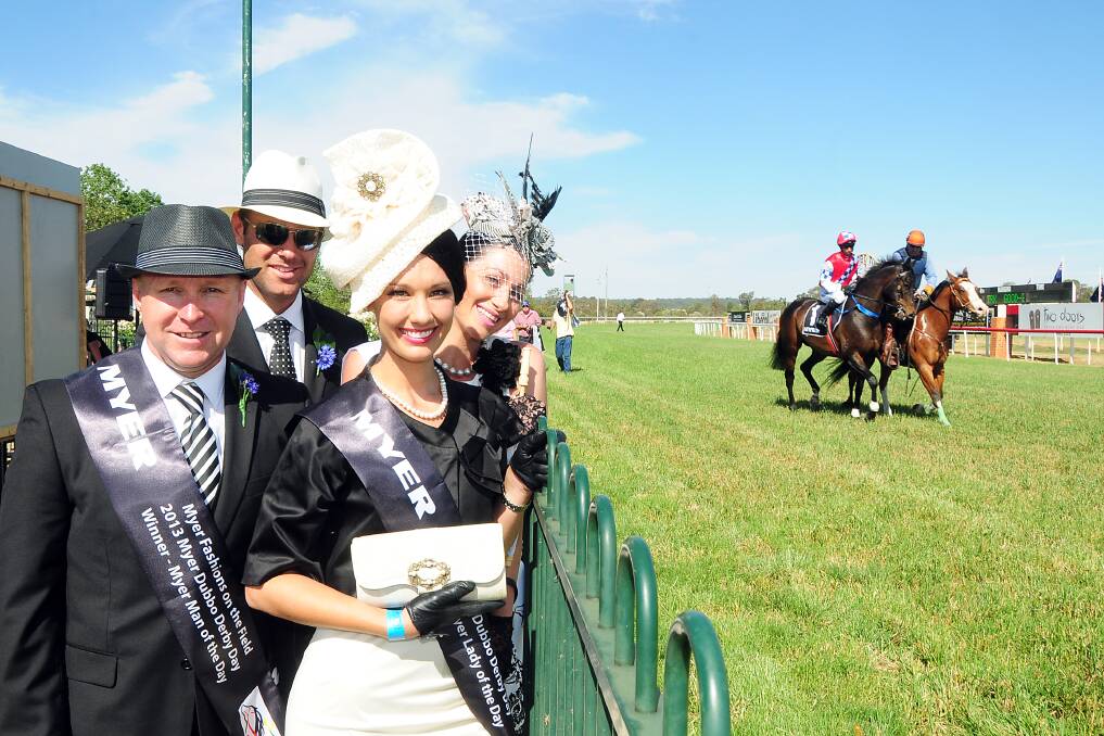 Myer Fashions on the Field men's winner Mark McMullan, runner-up Oscar Koch and ladies winner Sara Jackson and runner-up Renae Large enjoy the on track action at Myer Dubbo Derby Day. Photo: BELINDA SOOLE