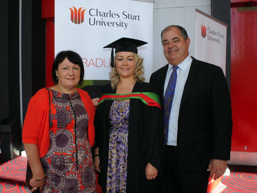 Proud parents Janet and John Walkom accompanied daughter Michala to her graduation in Dubbo yesterday. Photo: BELINDA SOOLE