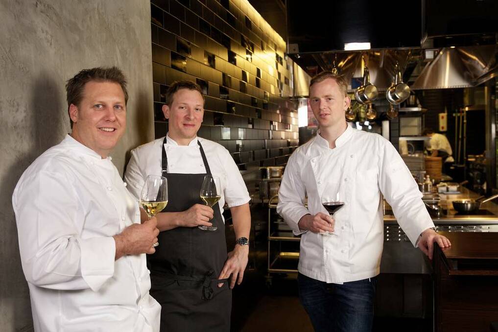 Three of the four finalists of the Good Food Guide Chef of the Year photographed at Momofuku restaurant at The Star. From left, Ross Lusted, Ben Greeno and Phil Wood. Photo: Wolter Peeters