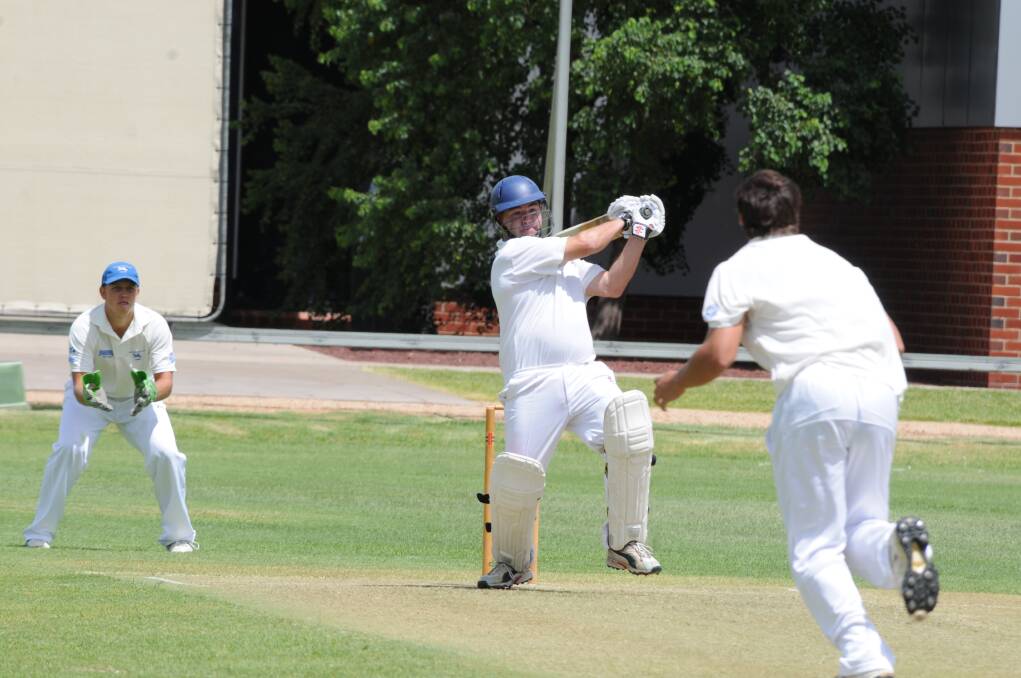Newtown's Wayne Dunlop goes on the attack during his century on Saturday. Unfortunately a late collapse by his team undid all the good work. 						   Photo: KATHRYN O'SULLIVAN