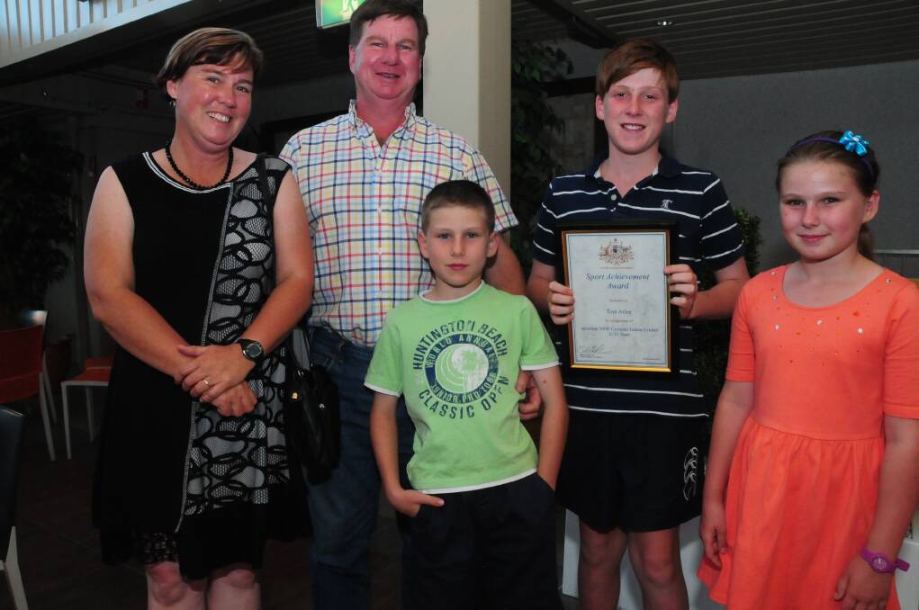 Belinda and Bruce Atlee with their children, Anthony Tom and Emily at the award ceremony on Tuesday night.