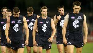 Carlton players leave the field after losing to Port Adelaide on Sunday. Photo: Pat Scala