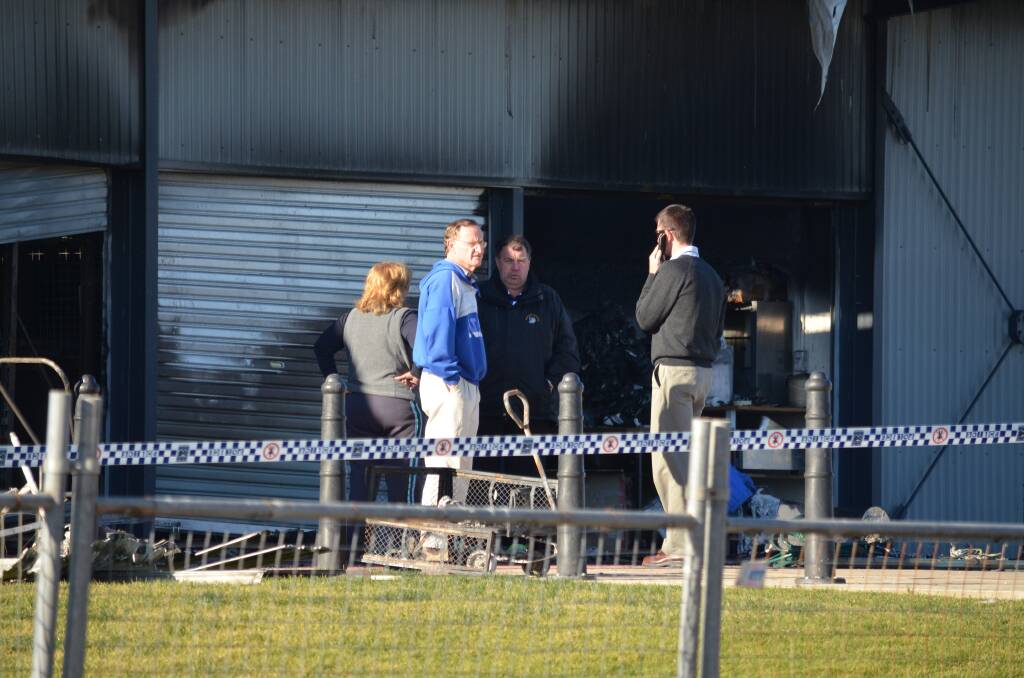 Mudgee Touch and Rugby League secretary Kathy Lang, Mudgee Touch treasurer Jim Yeo, Mudgee Wolves and Sports Council president Peter Mitchell, and Mid-Western Regional Council s business manager resources and recreation Julian Geddes view the damage to their respective store rooms following Monday morning s fire at Glen Willow.