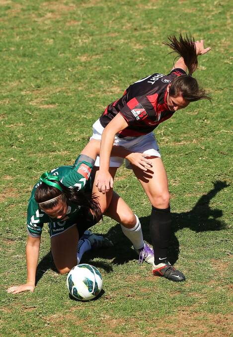 Dubbo's Vanessa Hart and Grenfell's Sammie Wood contest the ball during Canberra's W-League match with Western Sydney on the weekend. Photo: GETTY IMAGES