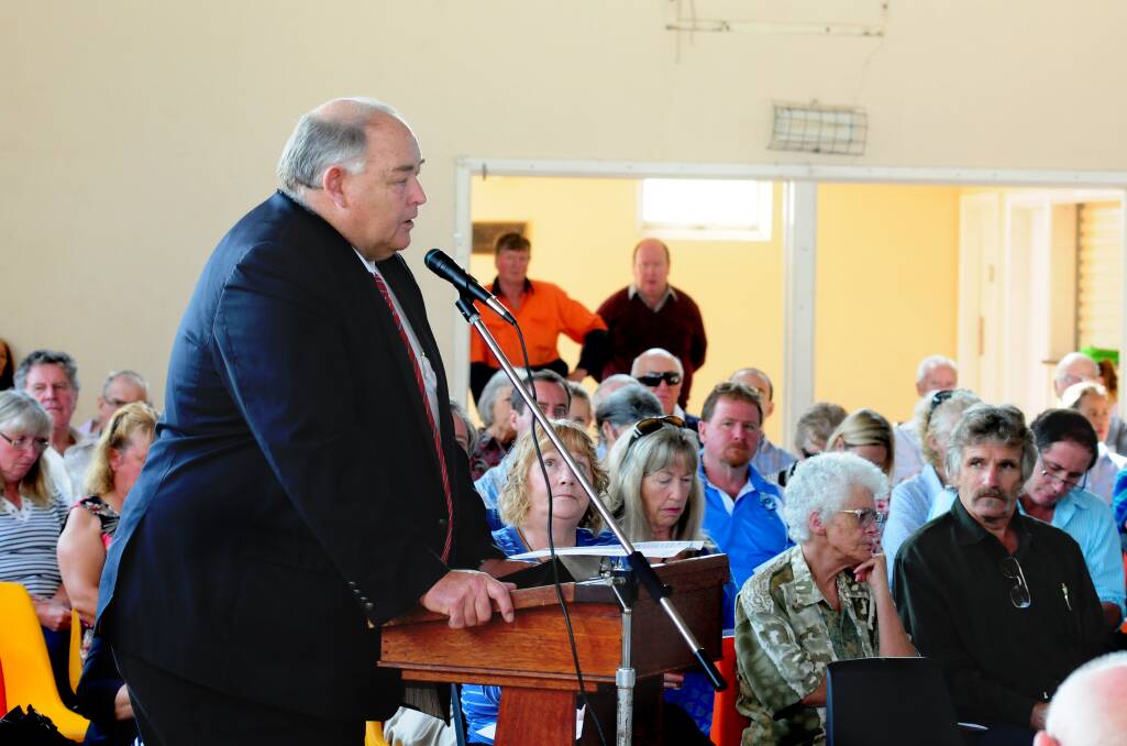 Warrumbungle Shire Council general manager Steve Loane stands up for Dunedoo and district at yesterday's meeting in the town called by the NSW Planning Assessment Commission.										         Photo: LOUISE DONGES