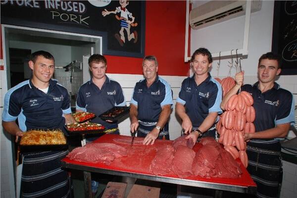 Jamie Towney, Ben O’Brien, Larry Dickson, Ray Pearson and John Fernance from Larry Dickson’s Burke Street butchery with a selection of the food that will be available to punters on Derby Day.