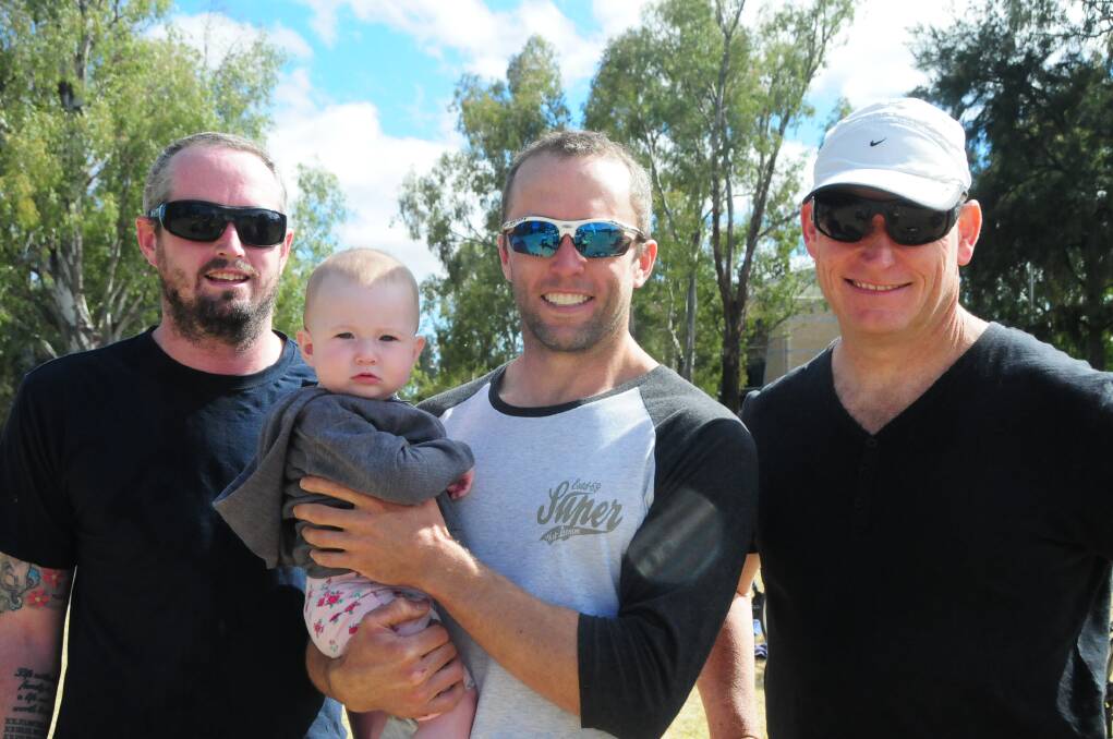 Daniel Goodstat, Evan and Poppie Goodstat and Dan Pobje took part in Sunday's triathlon and fundraiser.