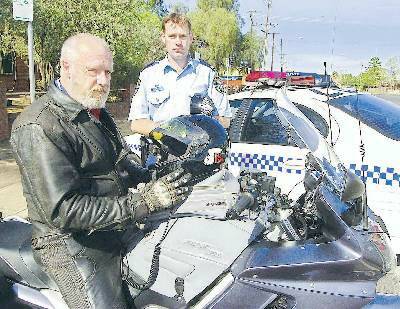 BE SEEN AND HEARD: Dubbo Ulysses Motorcycle Club member Geoff McMillan and Acting Sergeant Simon Madgwick are asking drivers to look out for motorbikes.