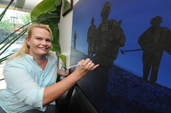 Dubbo woman Amber Martin, known as the ‘boot polish artist’ has been commissioned by the 2Combat Engineers Regiment (2CER) as a war artist for the Australian Army for the past two years.    Photo: AMY GRIFFITHS