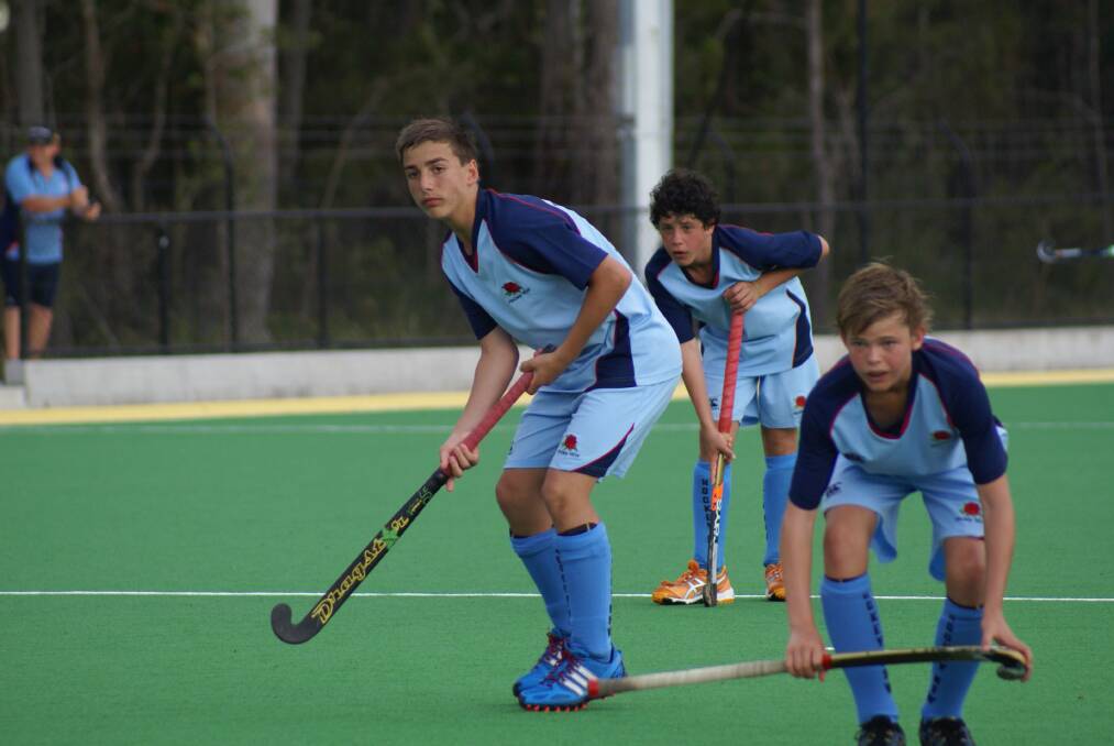 Dubbo's Dalton Medcalf and his NSW teammates set up a short corner during the Australian championships.