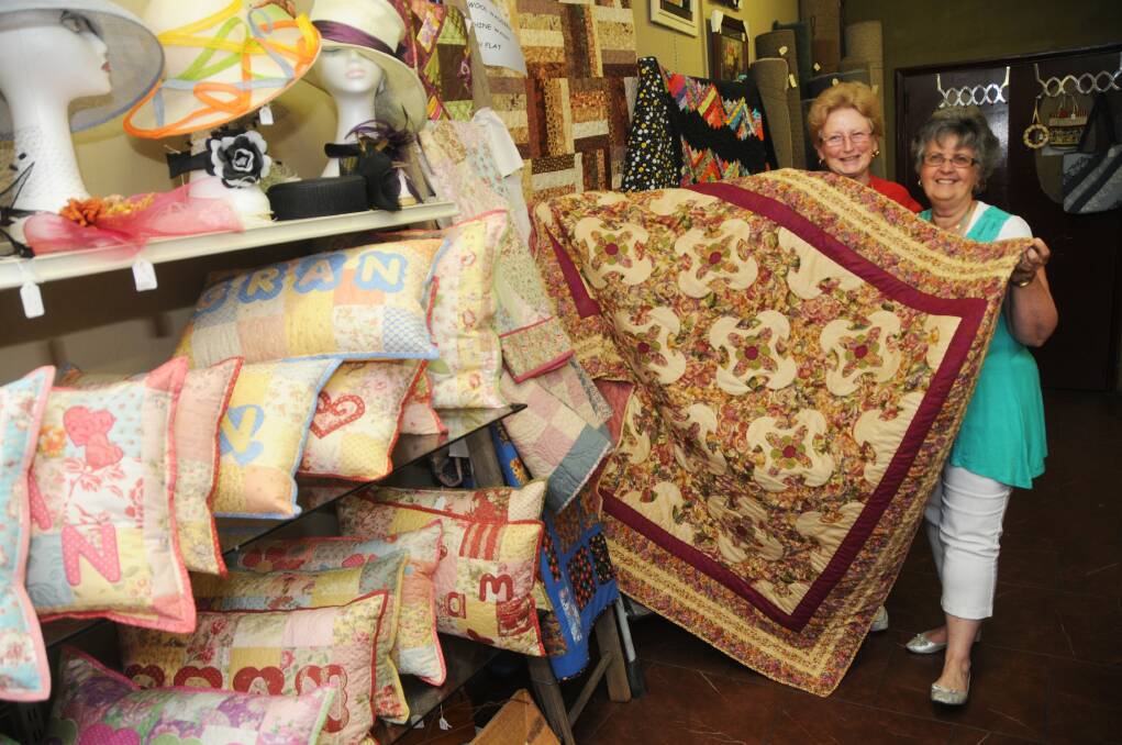 Margaret Chaseling and Judy White at the Christmas Arts and Crafts shop.  
Photo: AMY McINTYRE