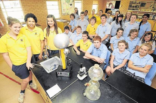 Jemma O’Leary, Indi Burke and Felicia Hamilton with their fellow students at the science and engineering challenge preview. Photo: AMY GRIFFITHS