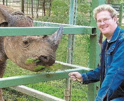 GUEST OF HONOUR: Former Australian Idol  finalist Peter Ryan, who was special guest at the Dubbo Outback Icon grand finale, meets up with Bakhita the rhinoceros at Western Plains Zoo.
