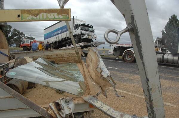 Two trucks collided about 25 km outside of Dubbo on the Golden Highway yesterday morning. Photo: AMY GRIFFITHS