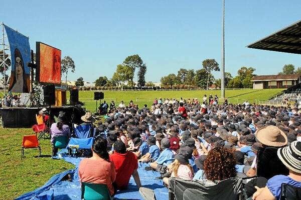 Thousands of Dubbo school children gathered at Apex Oval yesterday for a mass celebrating the canonisation of St Mary MacKillop. Photo: BELINDA SOOLE