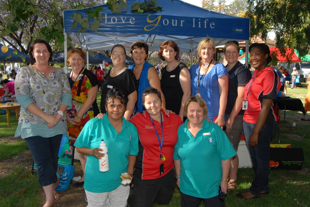 Mel Singh, Kerry Inder, Nicole Stonestreet, guest speaker Maggie Dent, Di Tierney, Lorna Brennan, Libby Wilson, Yvonne Muyambi, (front) Denise O'Donnell, Elissa Magner and Fran Schubert were among the 200 women and families at Thursday's inaugural Postnatal Depression Awareness event at Victoria Park. 			     Photo:	BELINDA SOOLE