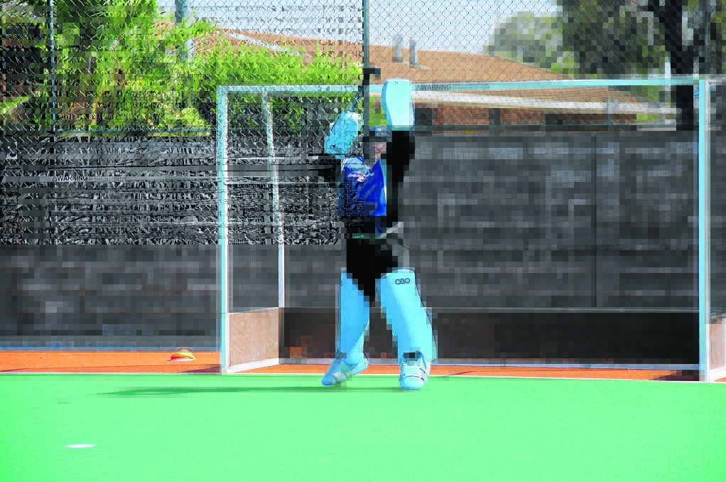 Paige Lebroque makes a save during one of the training drills.