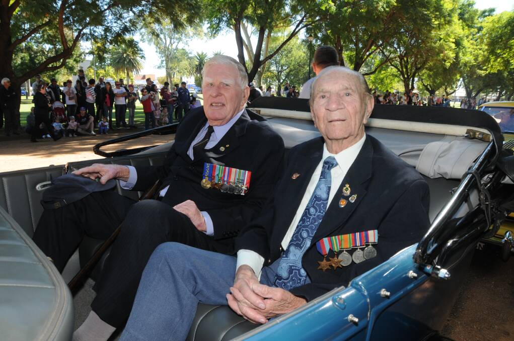 John Whittle and John Hill enjoyed a ride during the Anzac Day march.