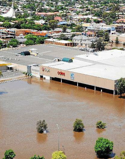Centro Dubbo, which contains shops and food outlets, was closed for business yesterday as floodwaters filled the under cover car park at the rear of the building. Photo: AMY GRIFFITHS