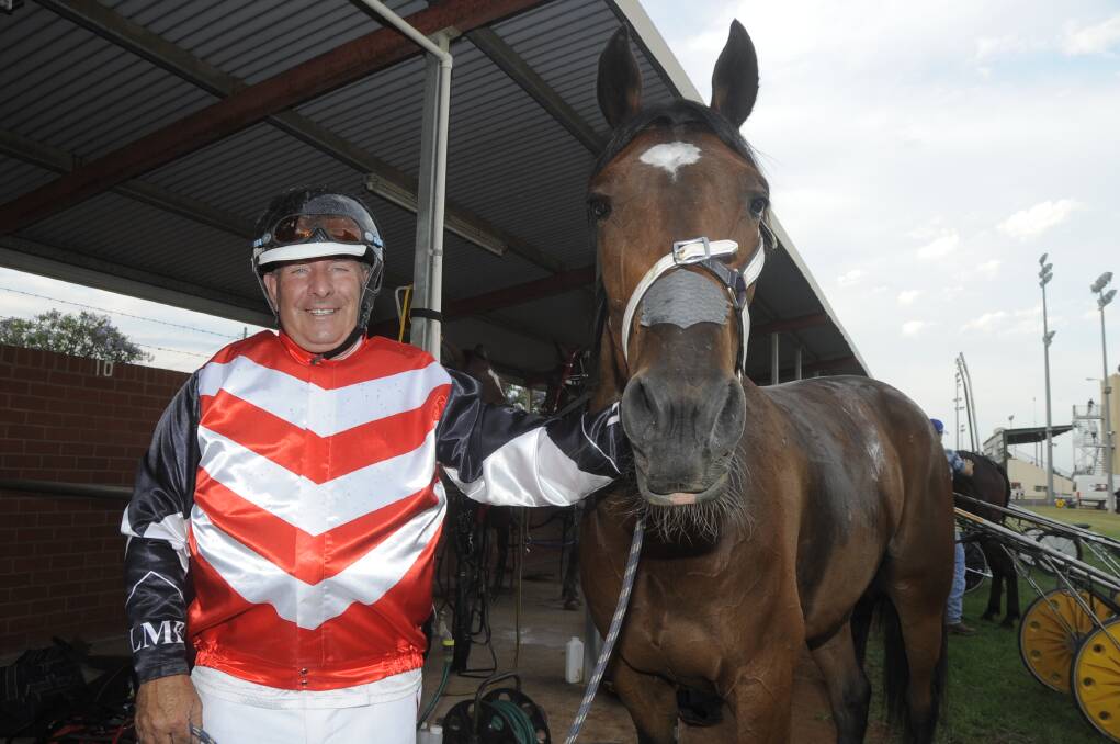 DSC 7984 
 
 
All smiles from Leighton Burns pictured here with Tiz A Falcon after winning The Daily Liberal Pace at the Dubbo TAB meeting Saturday night. Photo: CHERYL BURKE.