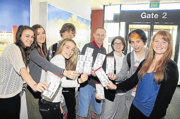 Ruby Janetzki, Thalia Smith, Jessica Hull (front), Angus Ray, Joshua Black, Rebecca Matthews, Nicholas Steepe, Emma Kilsby get ready to fly out of Dubbo on their way to Minokamo yesterday. They were to meet up with two other members of the exchange team in Sydney.