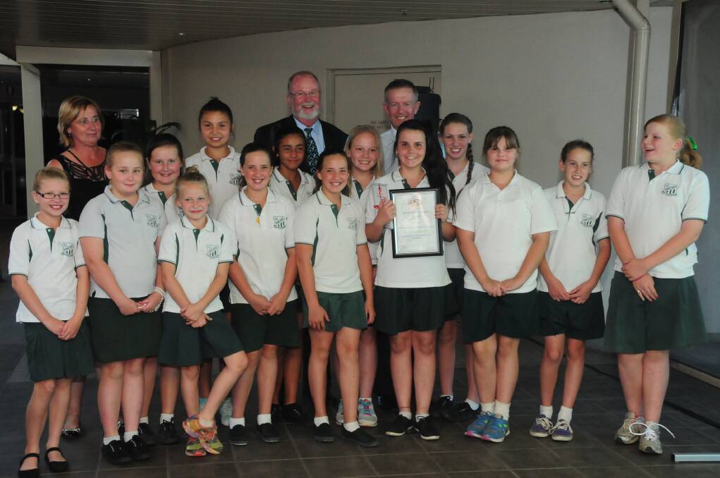 The North Dubbo Public hockey team were the PSSA Western Area champions for 2013. They are pictured with coach Debbie Williams, Dubbo Councillor Allan Smith and Member for Parkes Mark Coulton.							     Photos: LOUISE DONGES