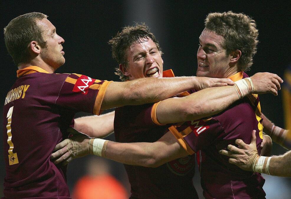 Ben Hornby and Kurt Gidley congratulate Anthony Quinn, who scored the match-winning try in the dying minutes.