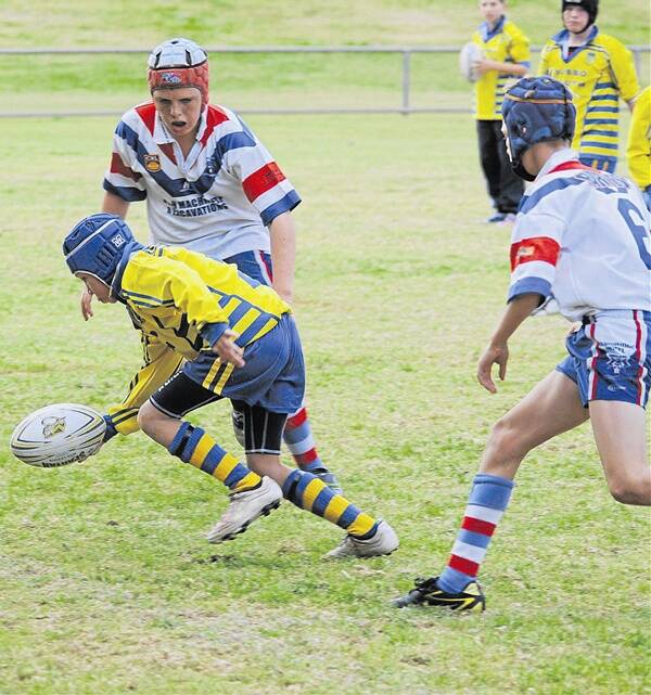 Tristian Delany crossed for a great try for Dubbo South Primary in yesterday’s David Peachey Shield final won by Parkes’ Holy Family.