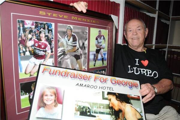 Former rugby league great Ron Boden with some of the memorabilia to be auctioned tonight to raise money for Georgie Brooke.