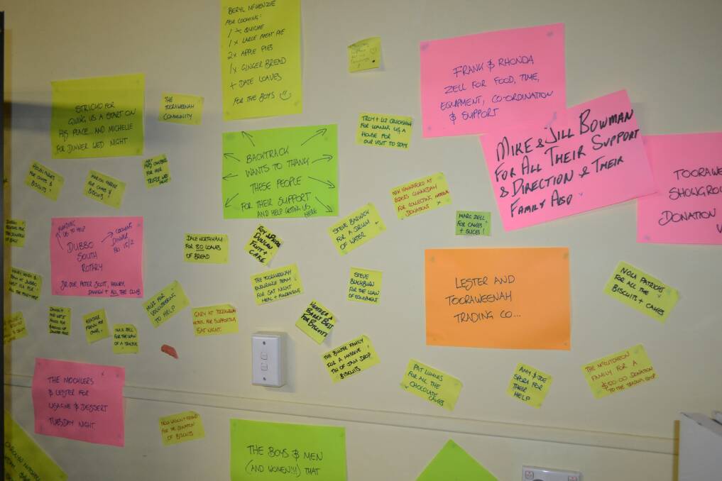 ABOVE:Boys and their dogs: Patrick Allan of Tamworth, Tom Moran, Armidale, Trey Werribone, Armidale, TJ Trindall, Tamworth and Garry Laurie, Armidale. 
BELOW: Honour wall - sticky notes acknowledging the contribution of donors supporting the BackTrack team during their stay at Tooraweenah