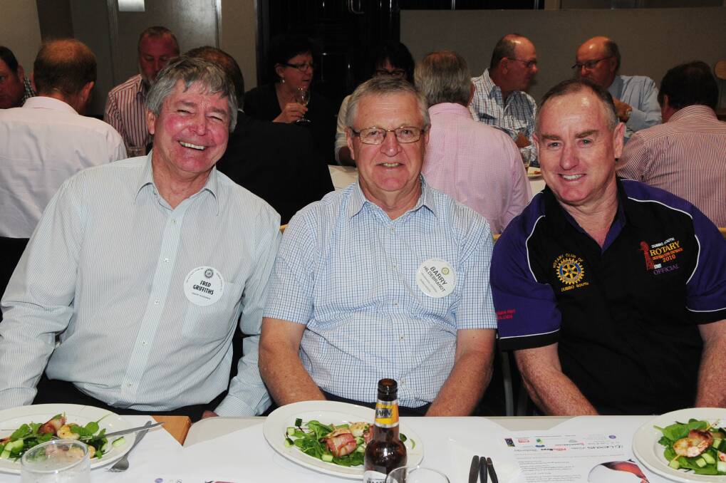 Fred Griffiths, Barry Hildebrandt and Brian Haling catch up after the naming of the new Paul Harris Fellow. Photo: BELINDA SOOLE