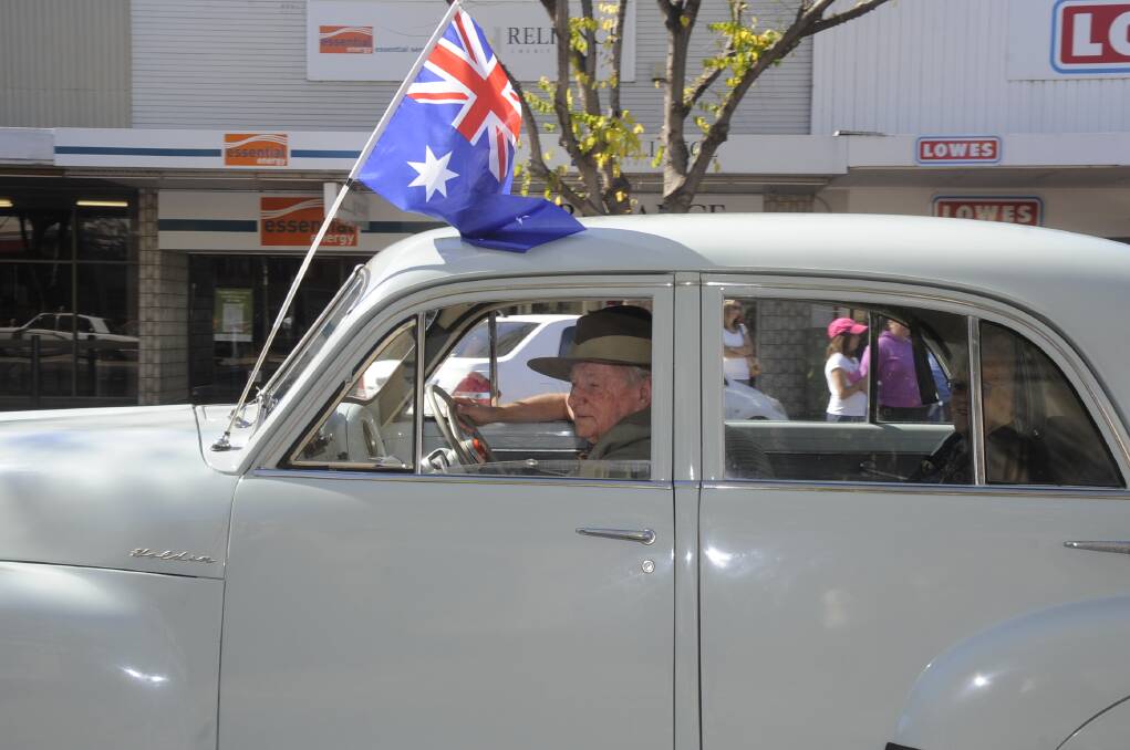 An early model FJ Holden was this mode of transport for this digger during the Anzac Day march.