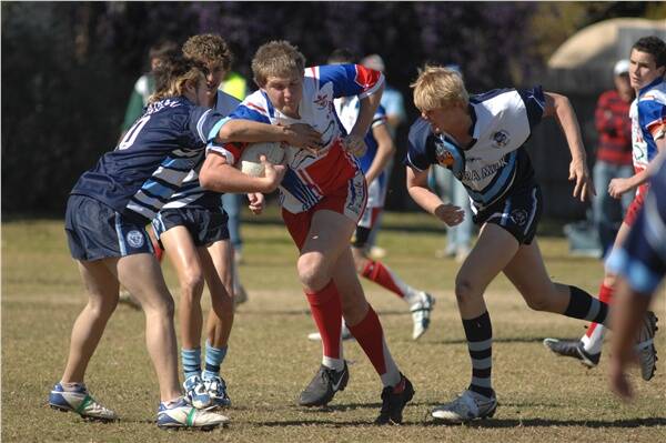 PCYC prop forward James McKinnon makes the South Dubbo defence to work hard to contain him in their Under-16s clash on Saturday.