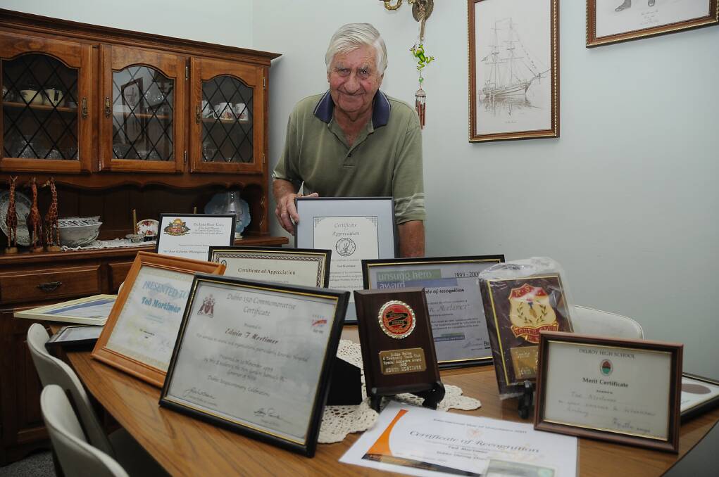 Dubbo resident Ted Mortimer with his many awards given to him over the yearsPhoto: Belinda Soole