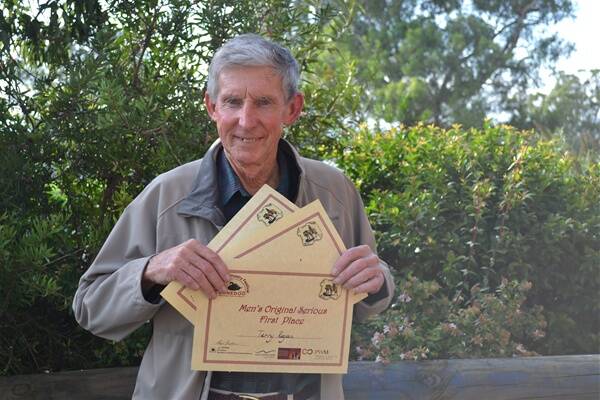 Terry Regan was very pleased after winning three first prizes at the Dunedoo Bush Poetry Festival.    Photo: ABANOB SAAD