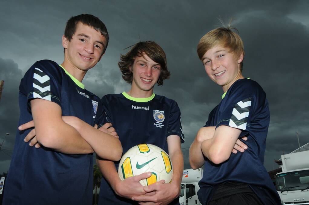 CAmeron Kopp, Kobe Rapley and Sam Head, in Coffs Harbour for this week's National Youth Soccer Championships. Photo: BELINDA SOOLE