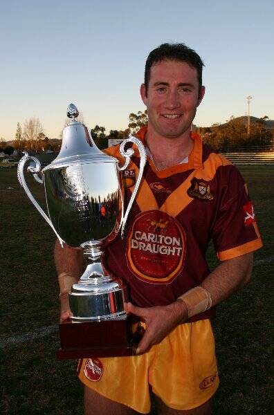 Darren Jackson with the Quad Series Trophy. Jackson begins his quest to hold onto the NSW Country hooker position in a trial against Group 9 today.