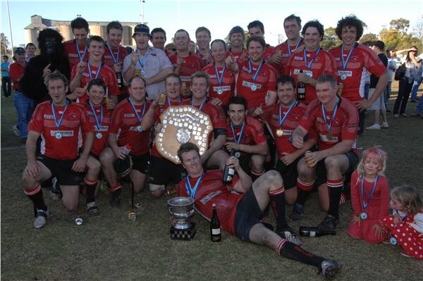 Narromine Gorillas celebrate after sealing their first Blowes Cup premiership with a 44-17 victory against Bathurst Bulldogs in the grand final.