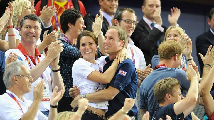 The Duke and Duchess shall now embrace: Kate and Will go for gold in the PDA stakes. <i>Photos: Getty.</i>